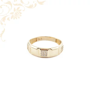 Négyszögletes  díszítésű arany gyűrű köves berakással