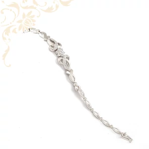 Gyönyörűségesen szép női arany karkötő, cirkónia kövekkel ékesítve. Gyönyörűségesen szép női arany karkötő, cirkónia kövekkel ékesítve.