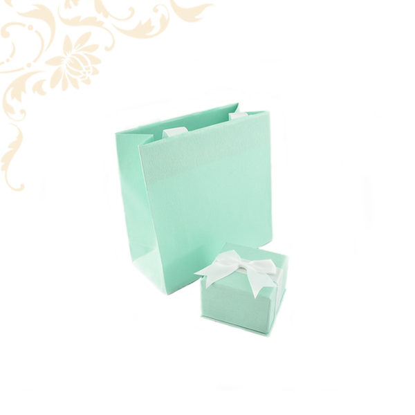 Zöld színű papír ékszerdoboz fehér masnival, gyűrű és fülbevaló - akár mindkettő - csomagolásához, papír táskával.